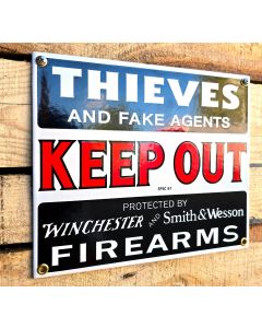 Keep out sign protected with firearms